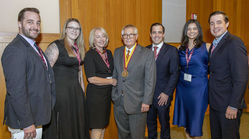Dr. Potkul (center wearing Stritch Medal) with family members